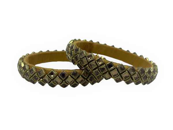 Yaalz Silk Thread Rich Kundan Stone Work Pair Bangles In Multiple Colors
