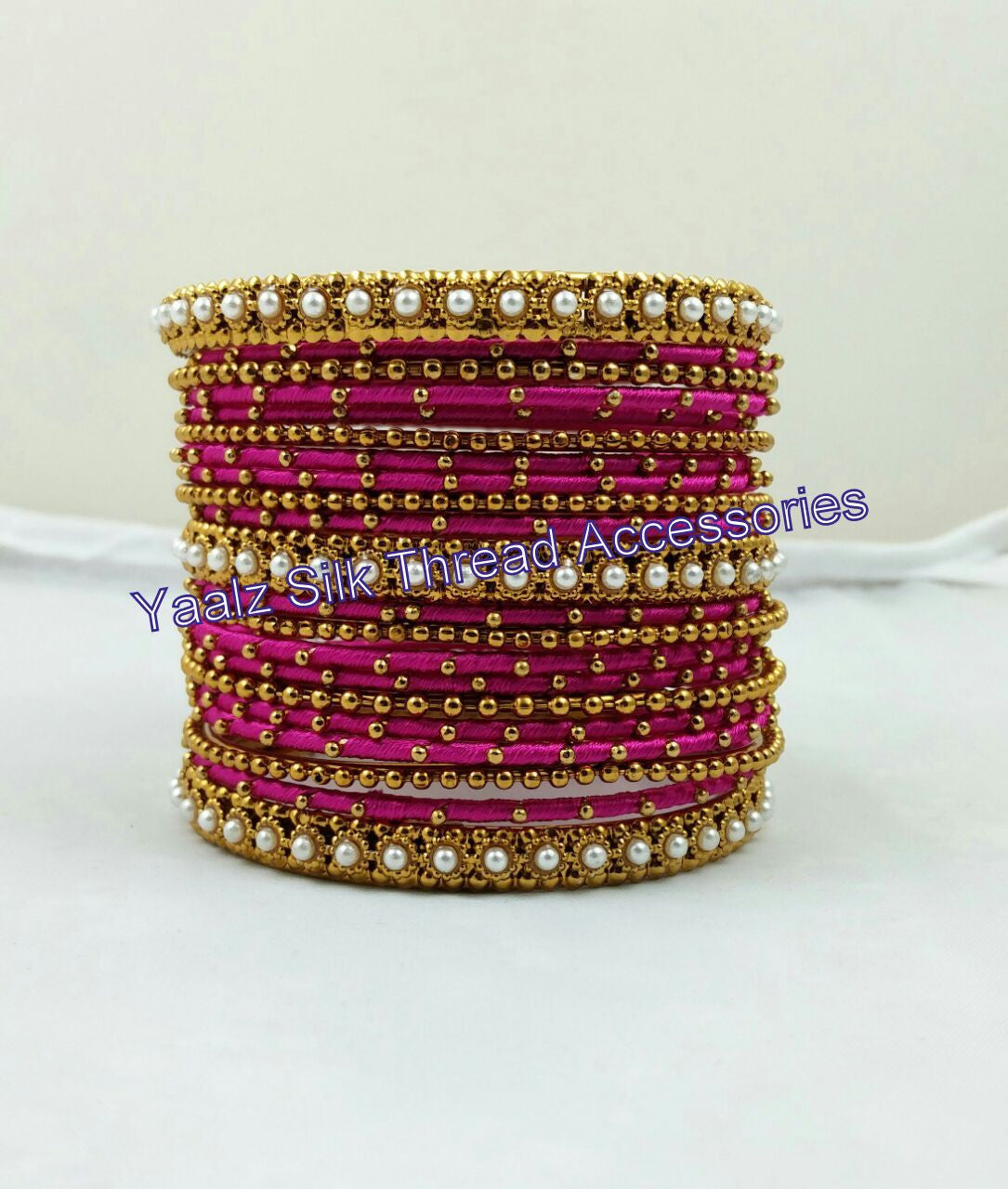 Yaalz Heavy Metal Party Wear Bangle Set in Dark Pink Color