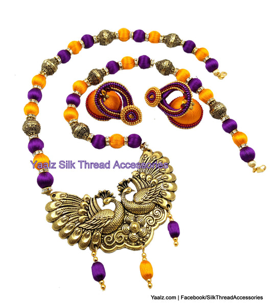 silk thread jewelry Bangle Earring Jumka-Yaalz Traditional Peacock Antique Pendant Neckset & Matching Bali Jumka in Purple And Orange Color Combo-YAALZ