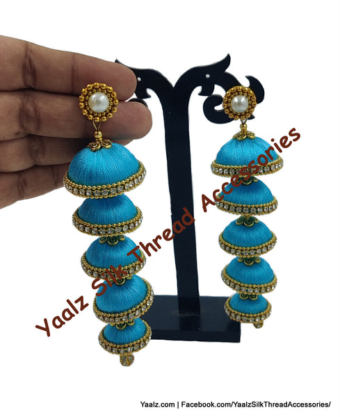 Yaalz Silk Thread 5 Layer Jhumka In Orange Color