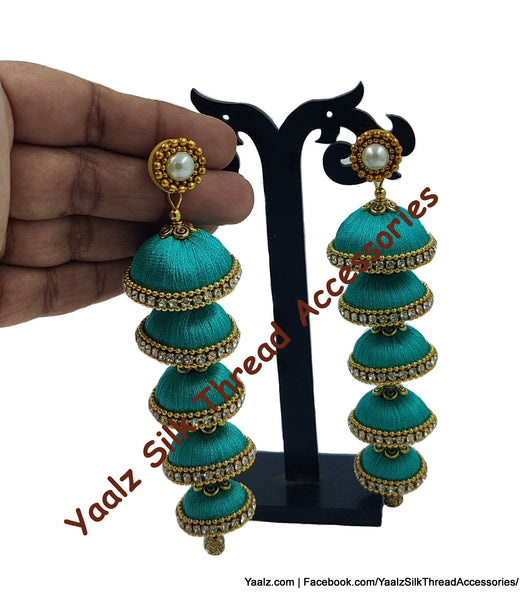 Yaalz Silk Thread 5 Layer Jhumka In Orange Color