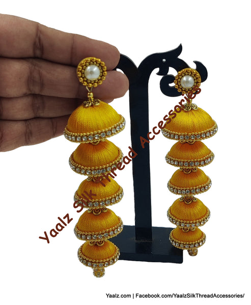 Yaalz Silk Thread 5 Layer Jhumka In Orange Color