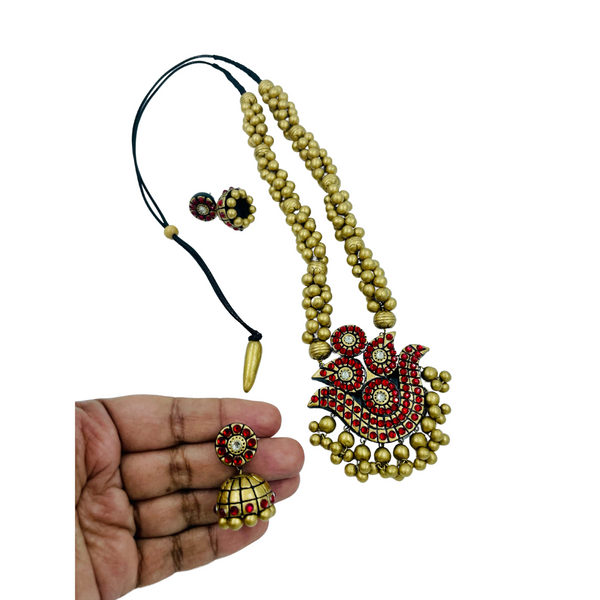 Yaalz Traditional Heavy Terracotta Art Neckset & Matching Jumka earrings in gold and Red Colours.
