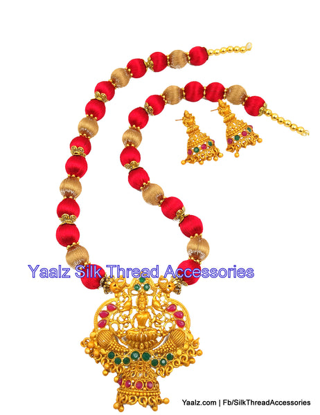 silk thread jewelry Bangle Earring Jumka-Yaalz Matt Finished Antique Lakshmi Pendant Set In Red & Gold Colors-YAALZ