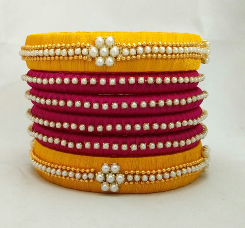 silk thread Bangle Earring Jumka-Yaalz Pearl Worked Bangle Set in Dark Pink And Mango Yellow Colors-YAALZ